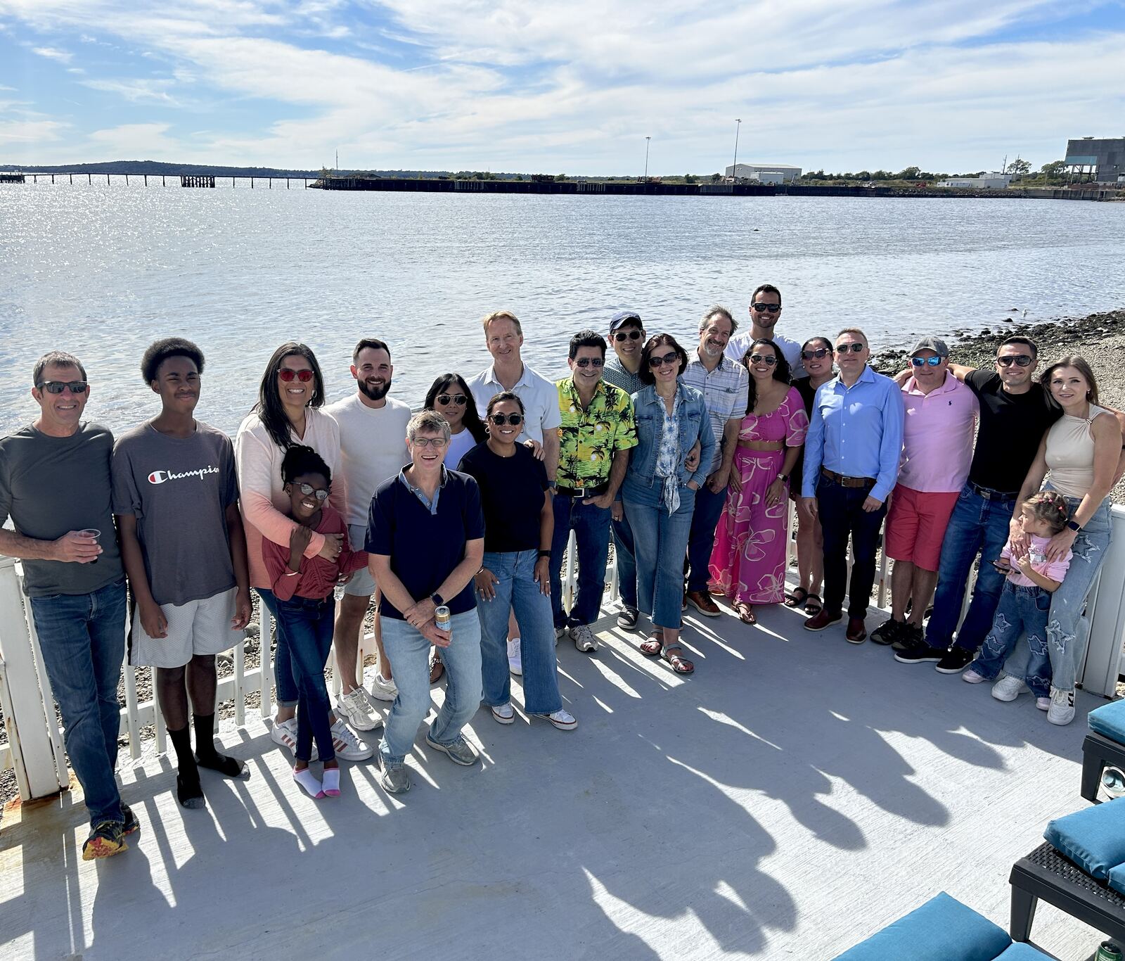 BNI Brookline Networkers members and families together at a waterfront summer party